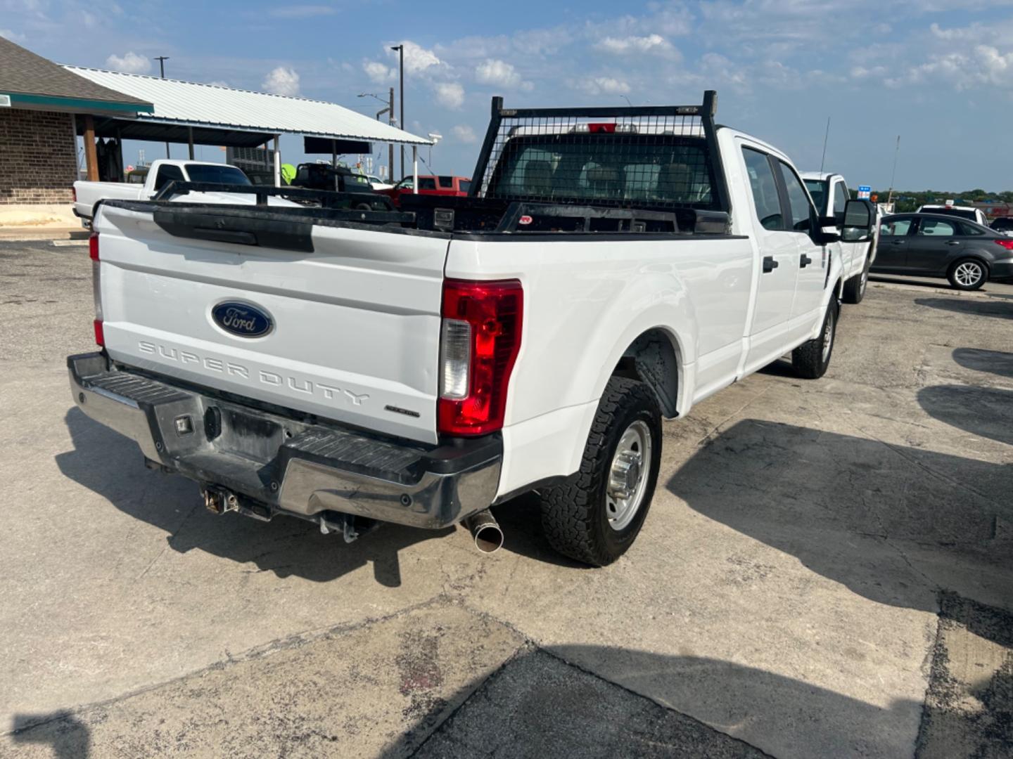 2019 White Ford F-250 SD Lariat Crew Cab Long Bed 2WD (1FT7W2A60KE) with an 6.2L V8 OHV 16V engine, 6A transmission, located at 1687 Business 35 S, New Braunfels, TX, 78130, (830) 625-7159, 29.655487, -98.051491 - Photo#2